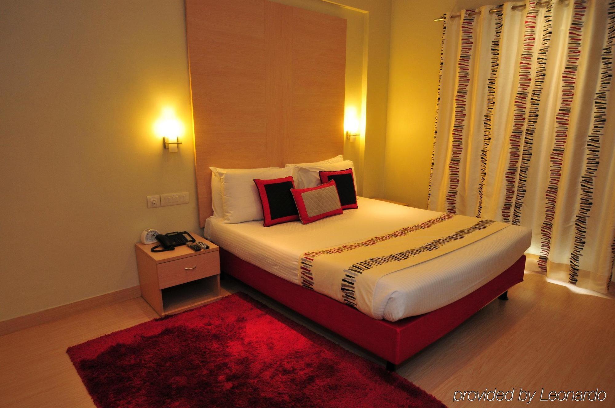 Avalon Courtyard Residence Suites Νέο Δελχί Δωμάτιο φωτογραφία